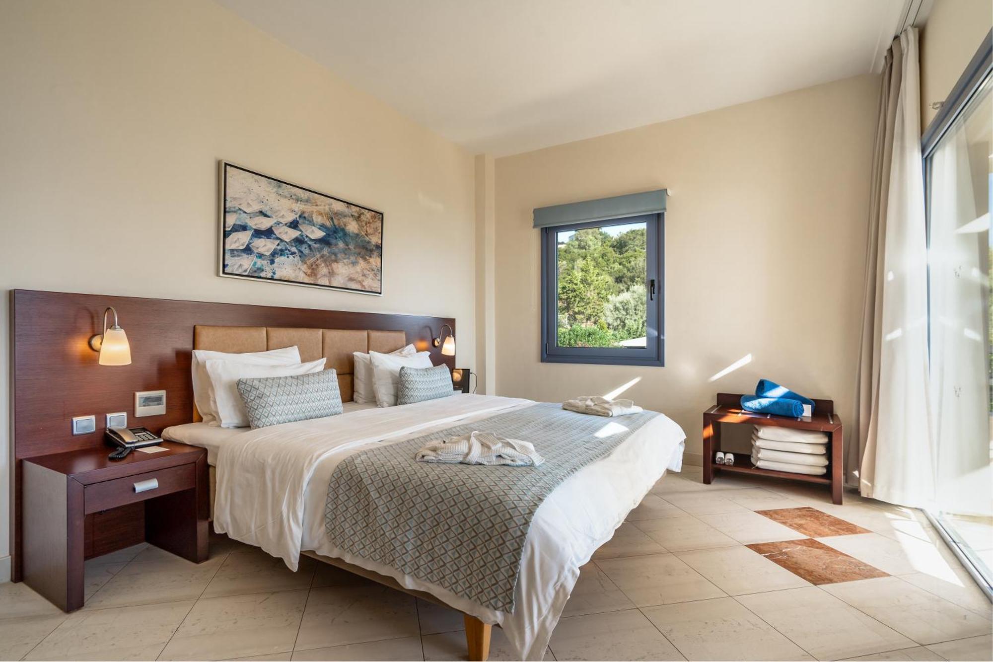 波尔托加里尼海滨度假酒店&Spa 尼基亚娜 外观 照片 A bedroom at the hotel